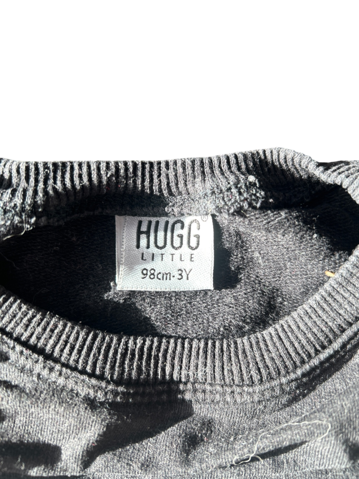 hugg Sweatshirt Black, white, and pink