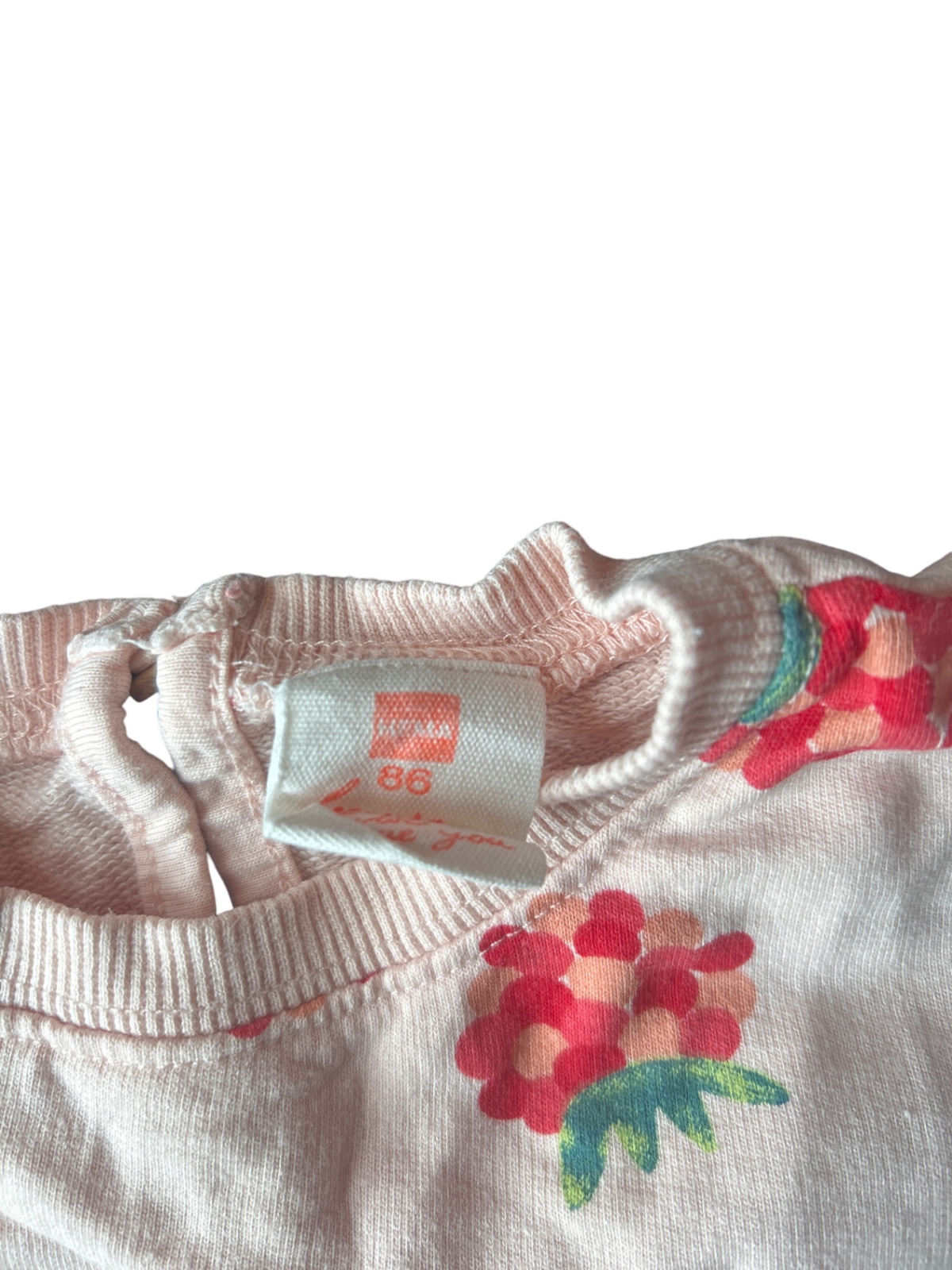 HEMA T-Shirt Off-white with red, pink, and green floral print