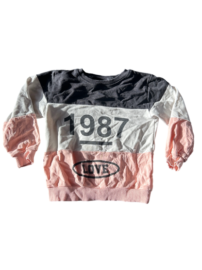 hugg Sweatshirt Black, white, and pink